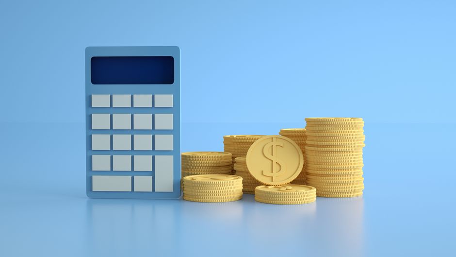 Set of modern house keys lies next to a small, neat stack of coins on a bright, clean table, symbolizing the financial sav...
